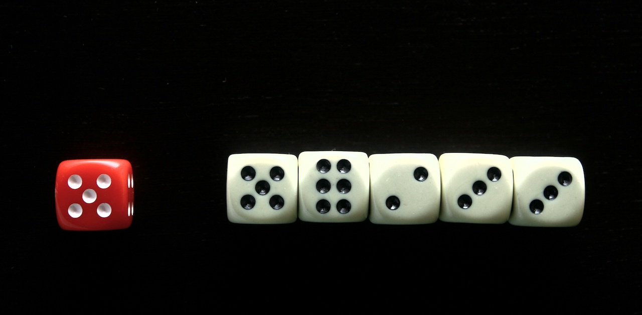 Six dice lined-up in a row.