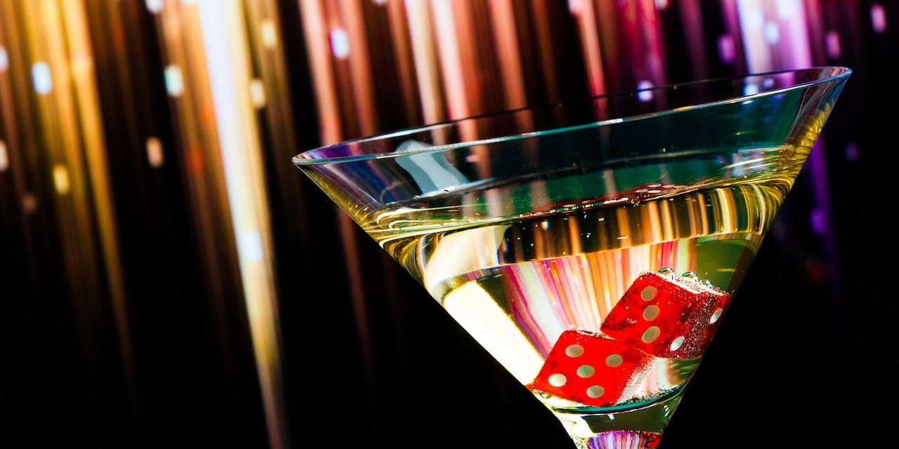 A New Year's cocktail with a pair of dice as ice cubes