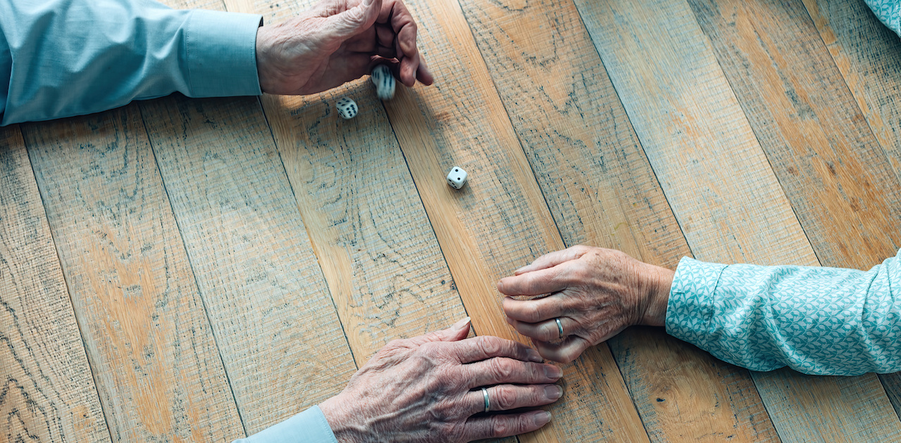 Seniors rolling dice.